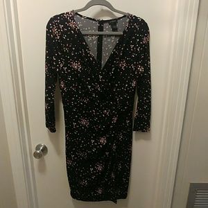 Black Polk a dot faux wrap dress